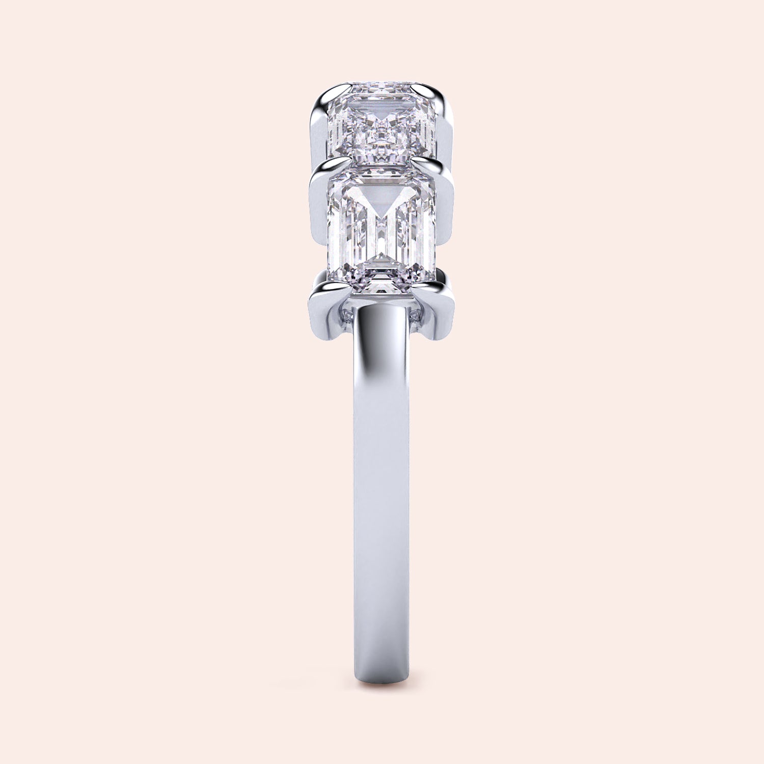 Elegant 14K or 18K white gold wedding band featuring five emerald-cut diamonds in an exquisite east-west setting. |
 #14KRecycledWhiteGold
 #18KRecycledWhiteGold
 
 
 
 
 #Platinum