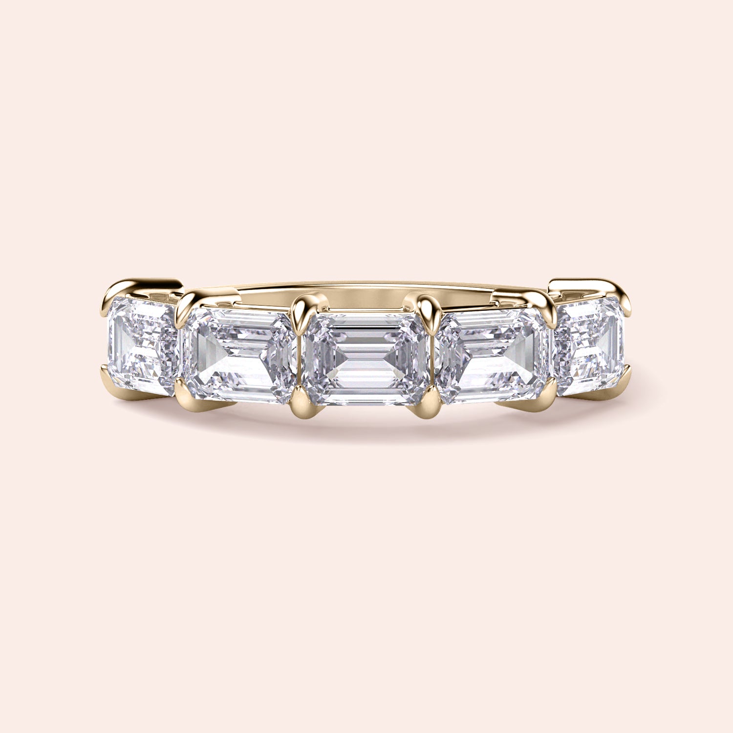 Elegant 14K and 18K gold wedding band featuring three emerald-cut diamonds, exuding timeless sophistication and luxury.|
 
 
 #14KRecycledYellowGold
 #18KRecycledYellowGold