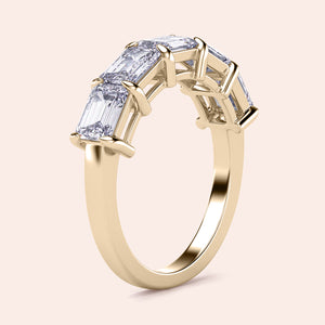 14K/18K gold wedding band featuring five emerald cut diamonds in a shared prong setting for a timeless look. 