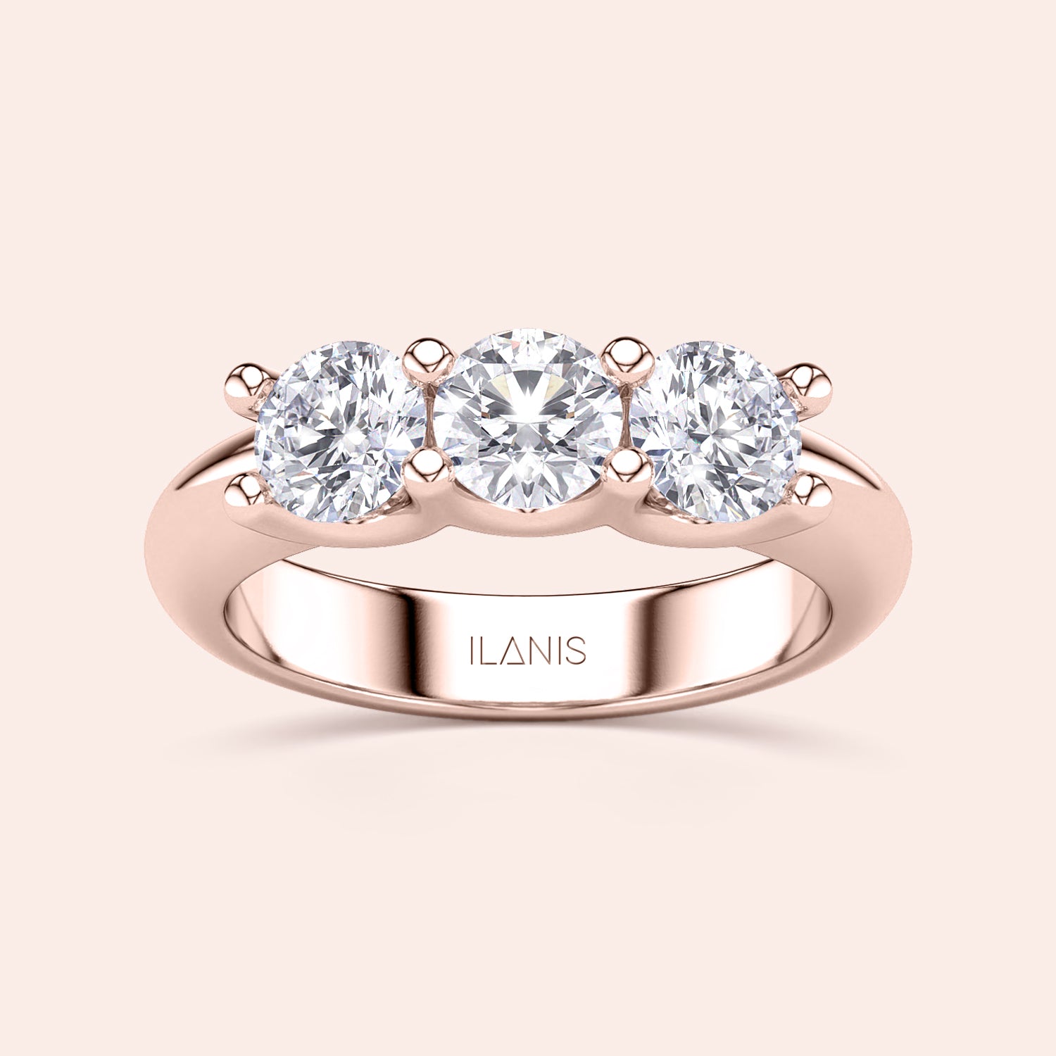 Elegant three-stone wedding band in 14K or 18K rose gold, featuring round brilliant diamonds in a prong setting. |
 
 
 
 
 #14KRecycledRoseGold
 #18KRecycledRoseGold