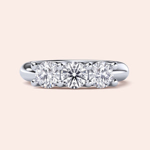 Elegant 14K/18K/Platinum wedding band featuring three round-cut diamonds, designed by Ilanis. Perfect for eternal love. 