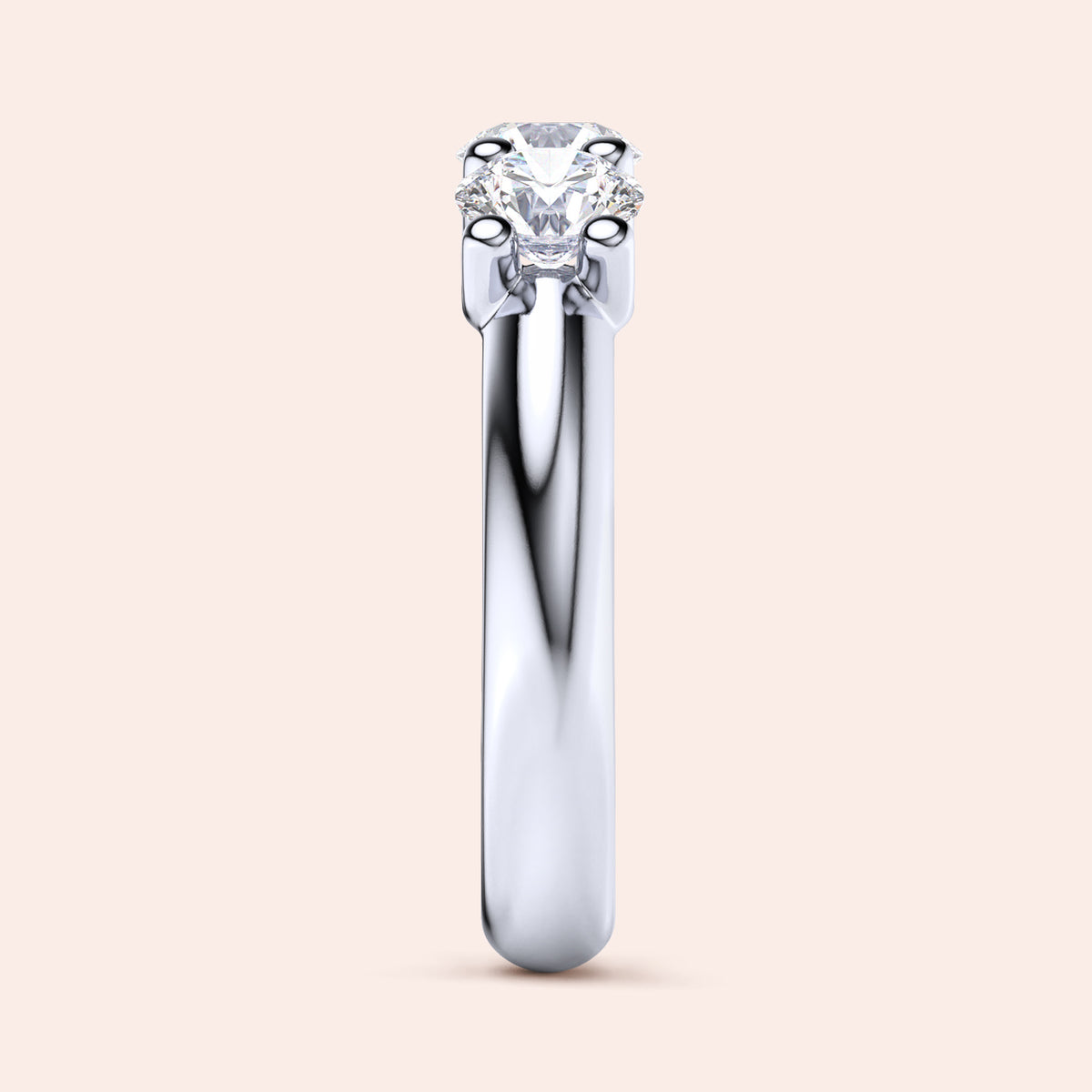 Elegant three-stone diamond wedding band in 14K or 18K white gold, featuring round brilliant-cut diamonds. Jewelry not worn. 