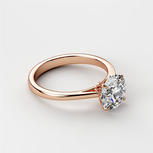 Elegant 14K or 18K rose gold solitaire engagement ring with a round brilliant-cut diamond on a minimalistic backdrop.