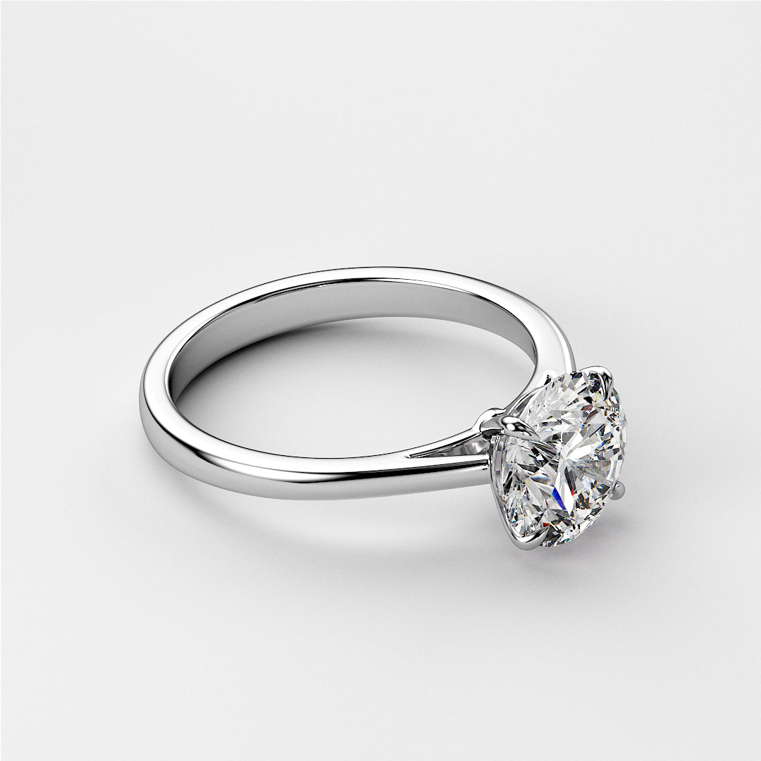 Round diamond solitaire engagement ring in 14K or 18K white gold, shown on a white background. Timeless elegance for your special moment.|

#14KRecycledWhiteGold
#18KRecycledWhiteGold








#Platinum