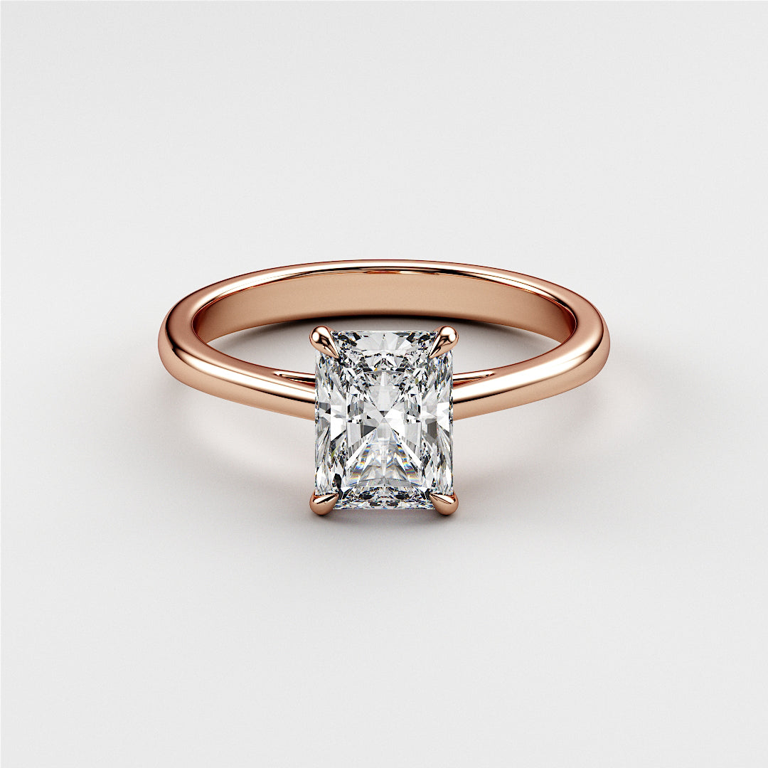 Rose gold engagement ring with radiant-cut diamond, available in 14K, 18K, or platinum settings. Elegant cathedral design.|







#14KRecycledRoseGold
#18KRecycledRoseGold


