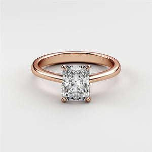 Rose gold engagement ring with radiant-cut diamond, available in 14K, 18K, or platinum settings. Elegant cathedral design.