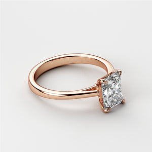 Radiant cut diamond engagement ring in 14K rose gold setting, elegant cathedral design, unworn and timeless beauty.