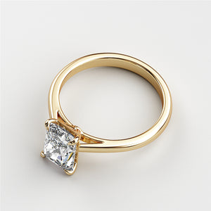 Elegant 14K Gold Engagement Ring with Radiant-Cut Diamond, showcasing timeless design and exquisite craftsmanship.