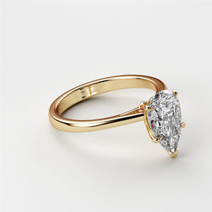 14K Gold Pear-Shaped Diamond Engagement Ring - side view of the elegant solitaire in a sleek cathedral setting.