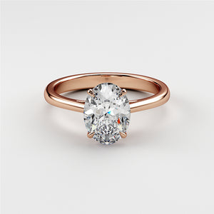Elegant rose gold engagement ring featuring an oval diamond centerpiece, available in 14K, 18K, and platinum.