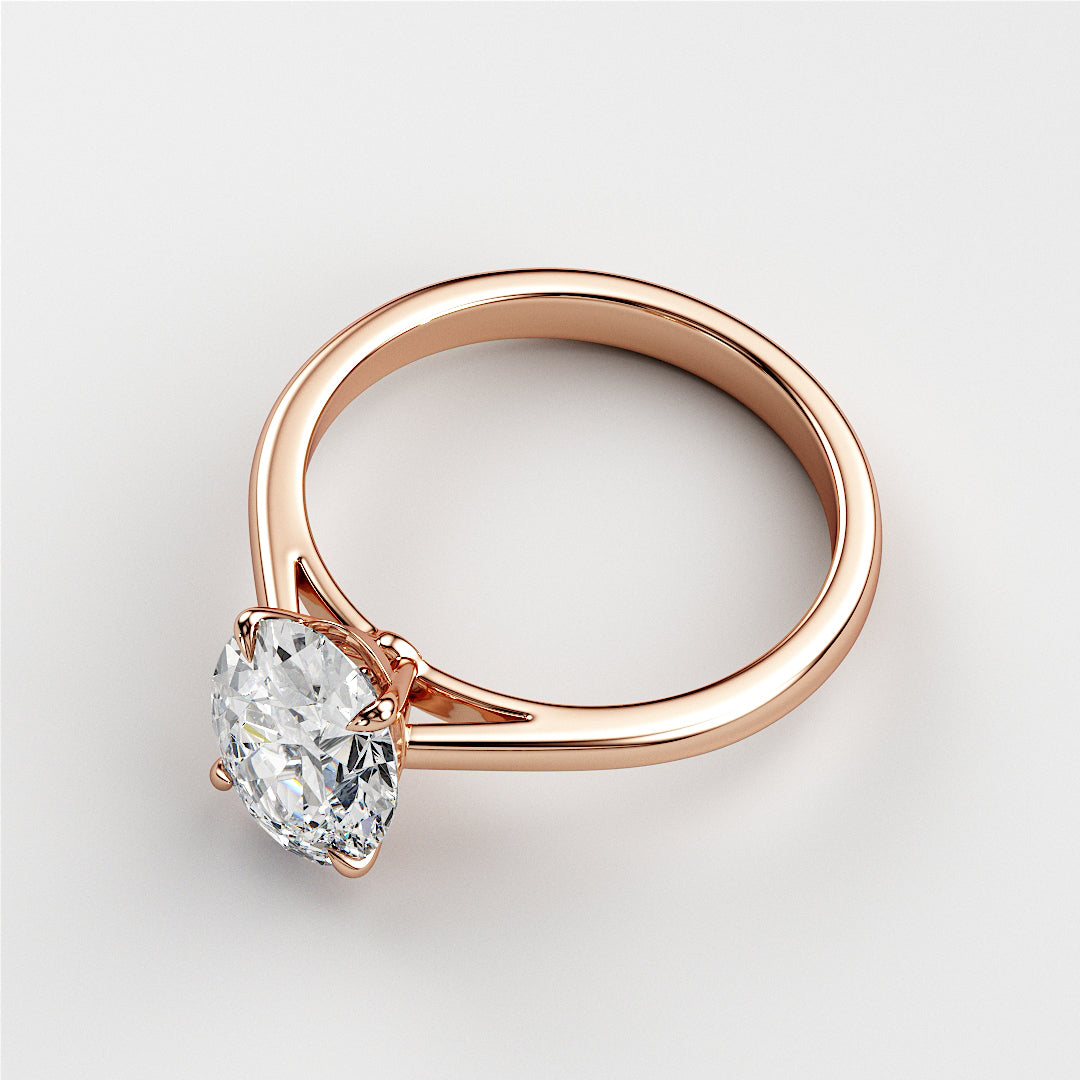 Elegant 14K/18K rose gold engagement ring featuring an oval classic solitaire diamond in a cathedral setting.|







#14KRecycledRoseGold
#18KRecycledRoseGold



