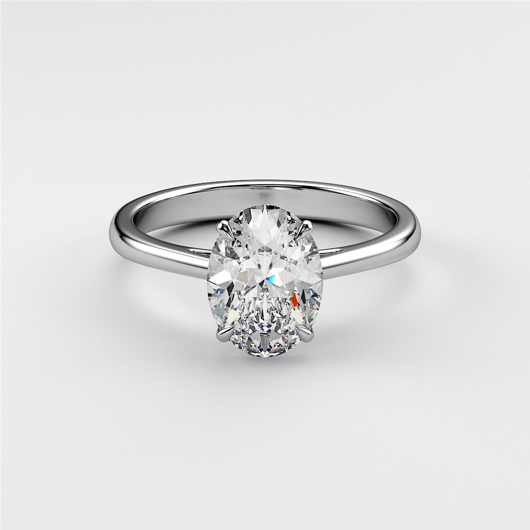 Elegant oval-shaped diamond engagement ring in a sleek 14K white gold band, perfect for timeless love and special moments.|

#14KRecycledWhiteGold
#18KRecycledWhiteGold








#Platinum