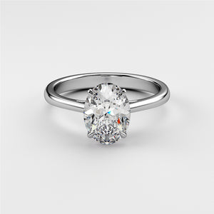 Elegant oval-shaped diamond engagement ring in a sleek 14K white gold band, perfect for timeless love and special moments.