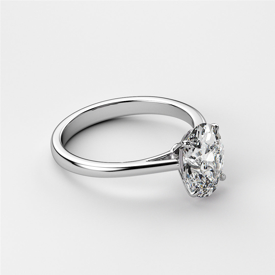 Elegant 14K white gold engagement ring featuring an oval-shaped diamond in a classic solitaire design.|

#14KRecycledWhiteGold
#18KRecycledWhiteGold








#Platinum