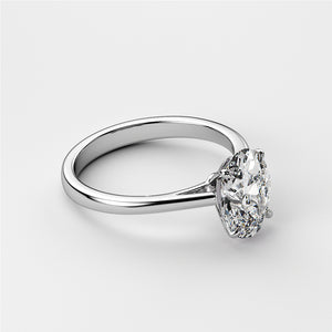 Elegant 14K white gold engagement ring featuring an oval-shaped diamond in a classic solitaire design.