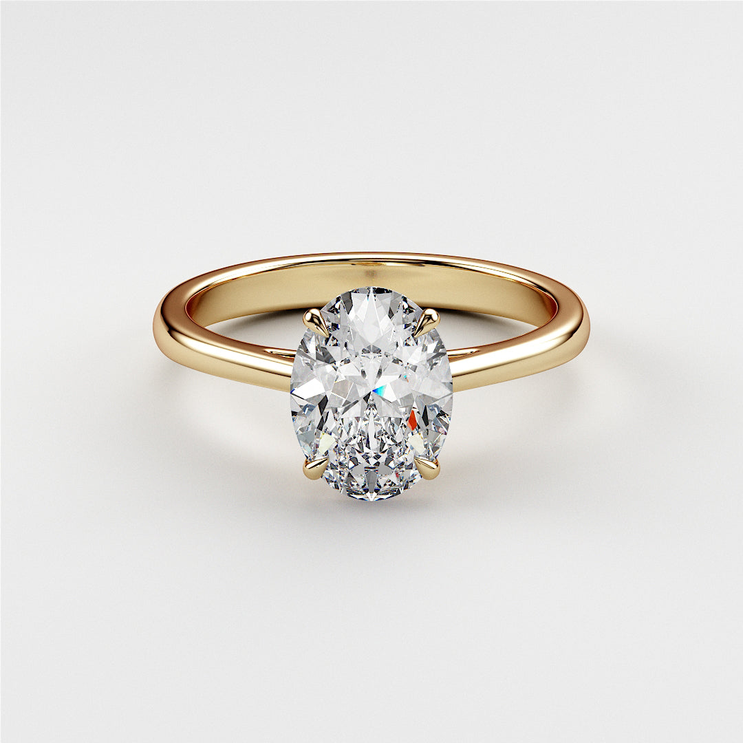 Elegant 14K or 18K gold engagement ring featuring an oval diamond in a classic cathedral design. Perfect for timeless elegance.|




#14KRecycledYellowGold
#18KRecycledYellowGold





