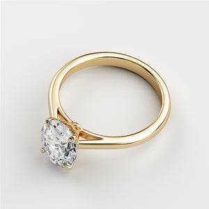 Elegant 14K yellow gold solitaire engagement ring with a brilliant round-cut diamond in a classic four-prong setting.