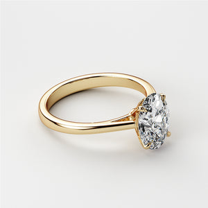Elegant yellow gold engagement ring featuring an oval diamond, available in 14K, 18K, or platinum for special proposals.