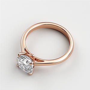 Rose gold diamond engagement ring in 14K/18K gold or platinum, featuring a stunning cushion-cut diamond on a white background.