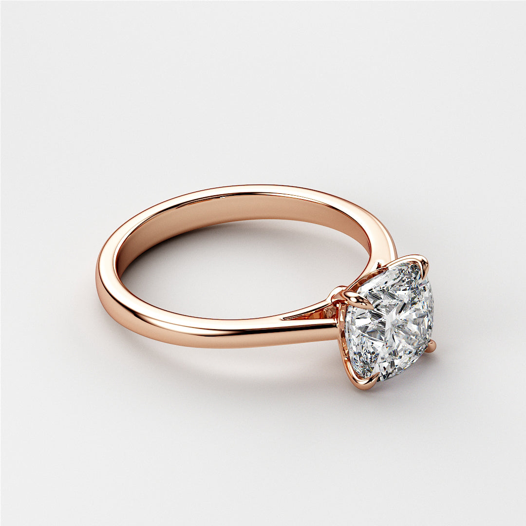 Stunning 14K Rose Gold engagement ring featuring a dazzling cushion-cut diamond in an elegant cathedral setting.