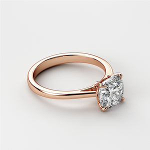 Stunning 14K Rose Gold engagement ring featuring a dazzling cushion-cut diamond in an elegant cathedral setting.