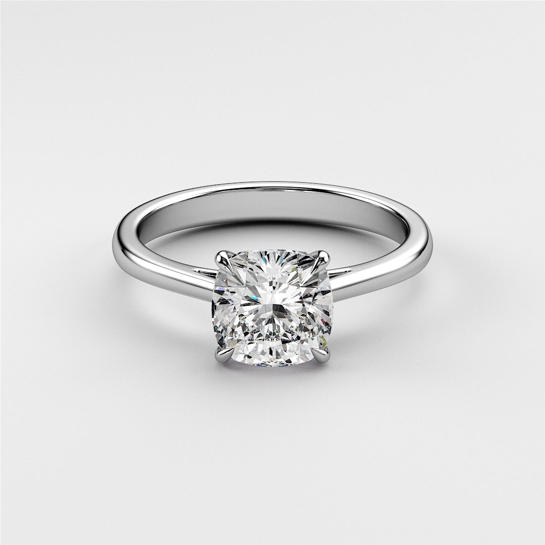 Elegant 14K, 18K, or platinum cushion-cut diamond engagement ring in a classic cathedral setting for a timeless proposal.