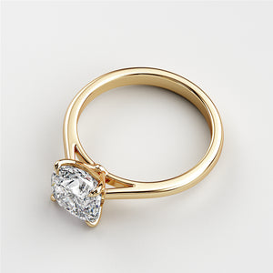 Elegant 14K yellow gold engagement ring featuring a stunning cushion-cut diamond, displayed on a white background.