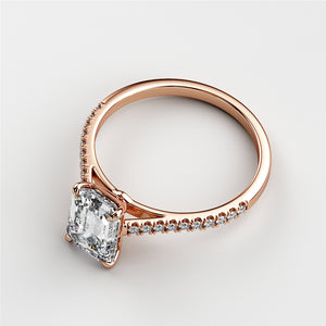 Elegant rose gold engagement ring featuring an Asscher-cut diamond and pave-set band; available in 14K, 18K gold, or platinum.