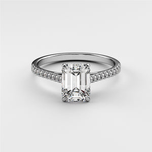 "14K or 18K white gold engagement ring featuring an emerald-cut diamond center stone and a pave diamond band."