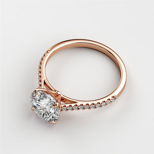Elegant rose gold engagement ring with oval diamond andPave setting, available in 14K, 18K, and platinum options.