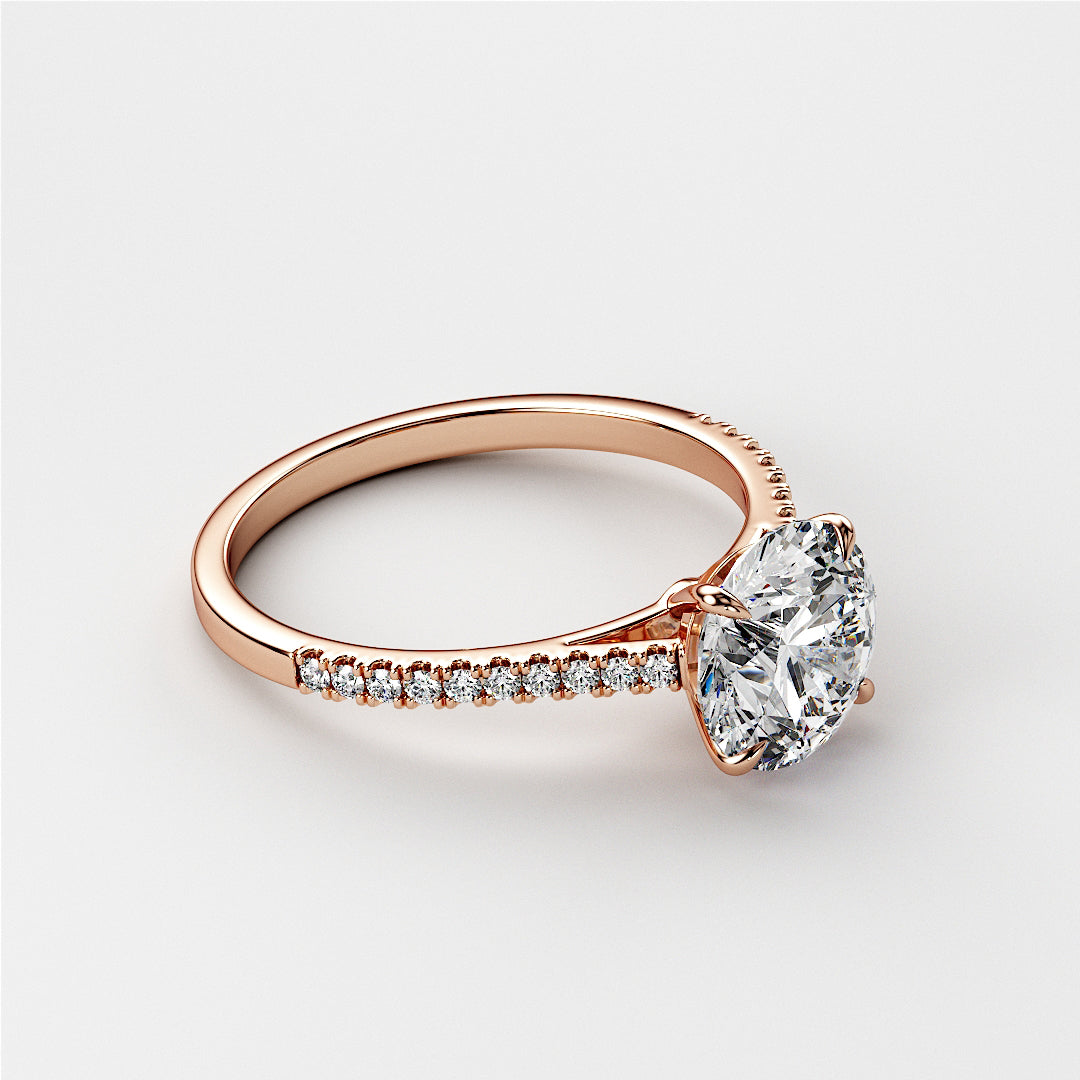 Rose gold engagement ring with a large round-cut diamond and pave band, available in 14K, 18K, or platinum.|







#14KRecycledRoseGold
#18KRecycledRoseGold


