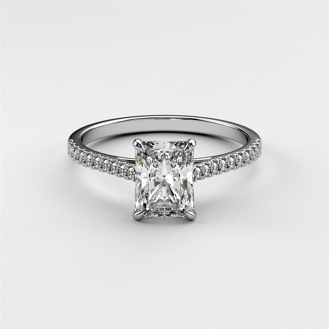 Elegant white gold engagement ring with radiant-cut diamond and pave accents, available in 14K, 18K gold, or platinum.|

#14KRecycledWhiteGold
#18KRecycledWhiteGold








#Platinum