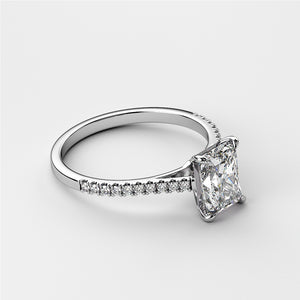 14K or 18K white gold radiant cut diamond engagement ring with pave band, elegant cathedral setting, luxurious shine.