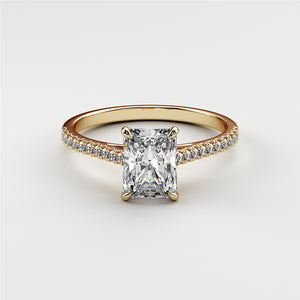 Radiant-cut diamond engagement ring with pave band in 14K or 18K yellow gold or platinum. Elegant and stunning design.