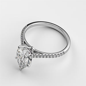 Elegant pear-shaped diamond engagement ring withPave band in 14K, 18K white gold, or platinum. Not worn on a model.