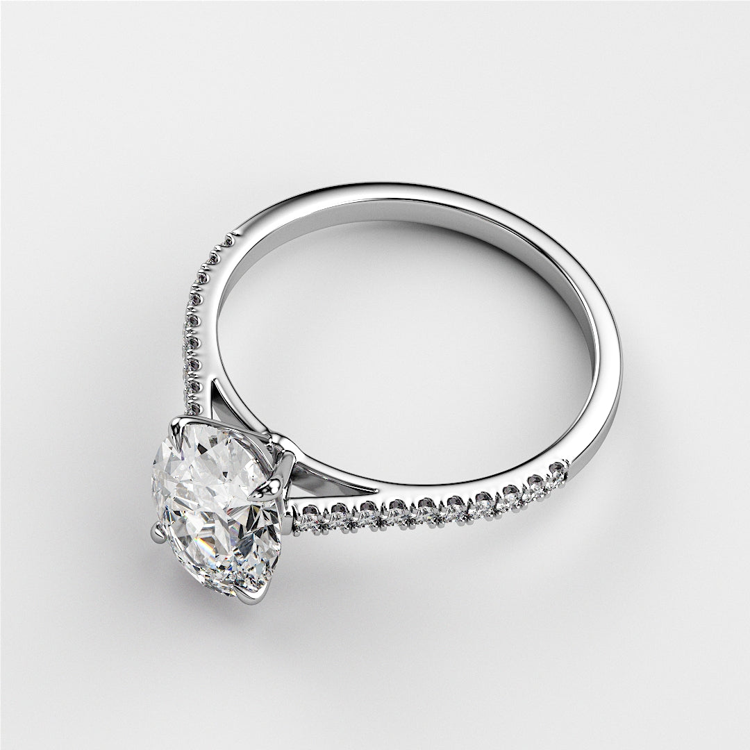 Luxury engagement ring featuring a marquise diamond set in a 14K white gold band with smaller diamonds, perfect for timeless elegance.
