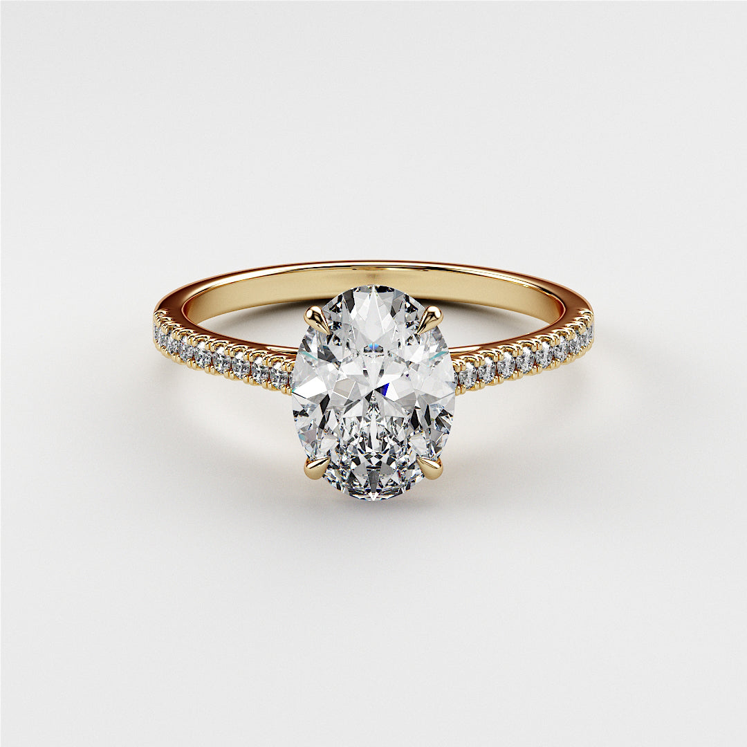 14K or 18K gold engagement ring featuring an elegant oval diamond center stone and a delicate pave band.|




#14KRecycledYellowGold
#18KRecycledYellowGold






