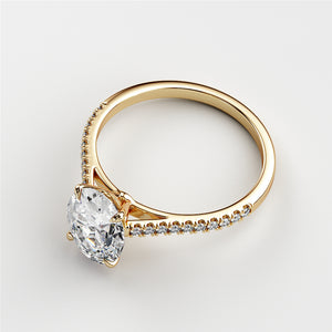 Elegant 14K and 18K gold or platinum engagement ring with an oval-cut diamond and diamond-accented band.