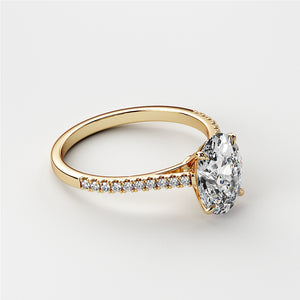 Elegant 14K Gold Oval Diamond Engagement Ring with Pave Band - Timeless Jewelry for Special Moments.