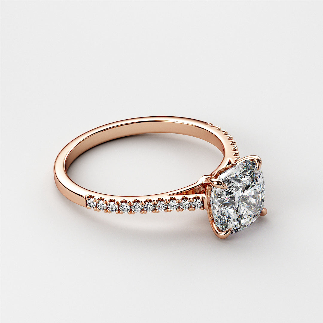 Elegant 14K Rose Gold cushion-cut diamond engagement ring with accent diamonds, showcasing timeless beauty and sophistication.
