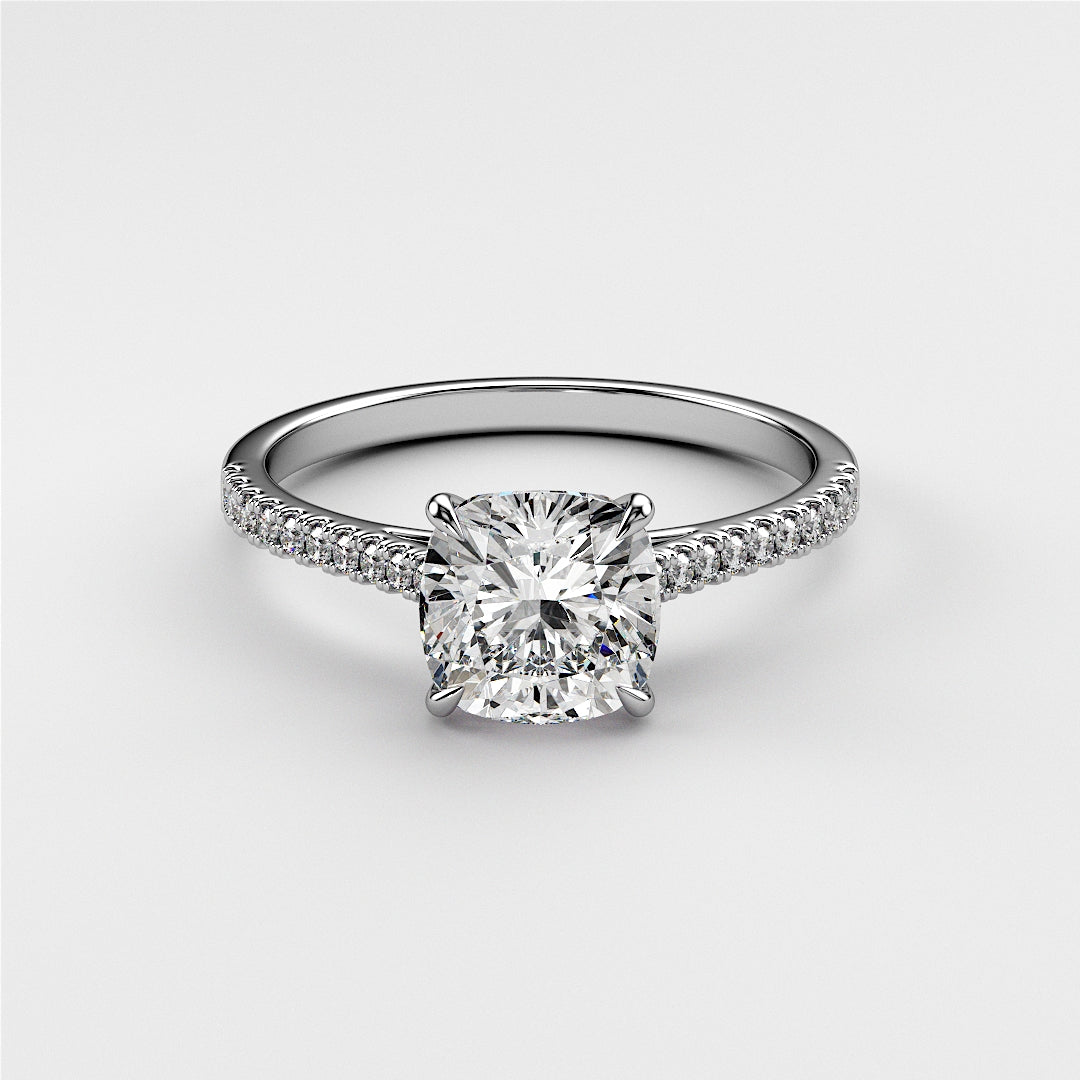 Stunning 14K/18K white gold cushion cut diamond engagement ring with pave band, showcasing brilliance and sparkle.