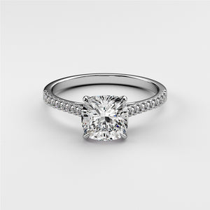 Stunning 14K/18K white gold cushion cut diamond engagement ring with pave band, showcasing brilliance and sparkle.
