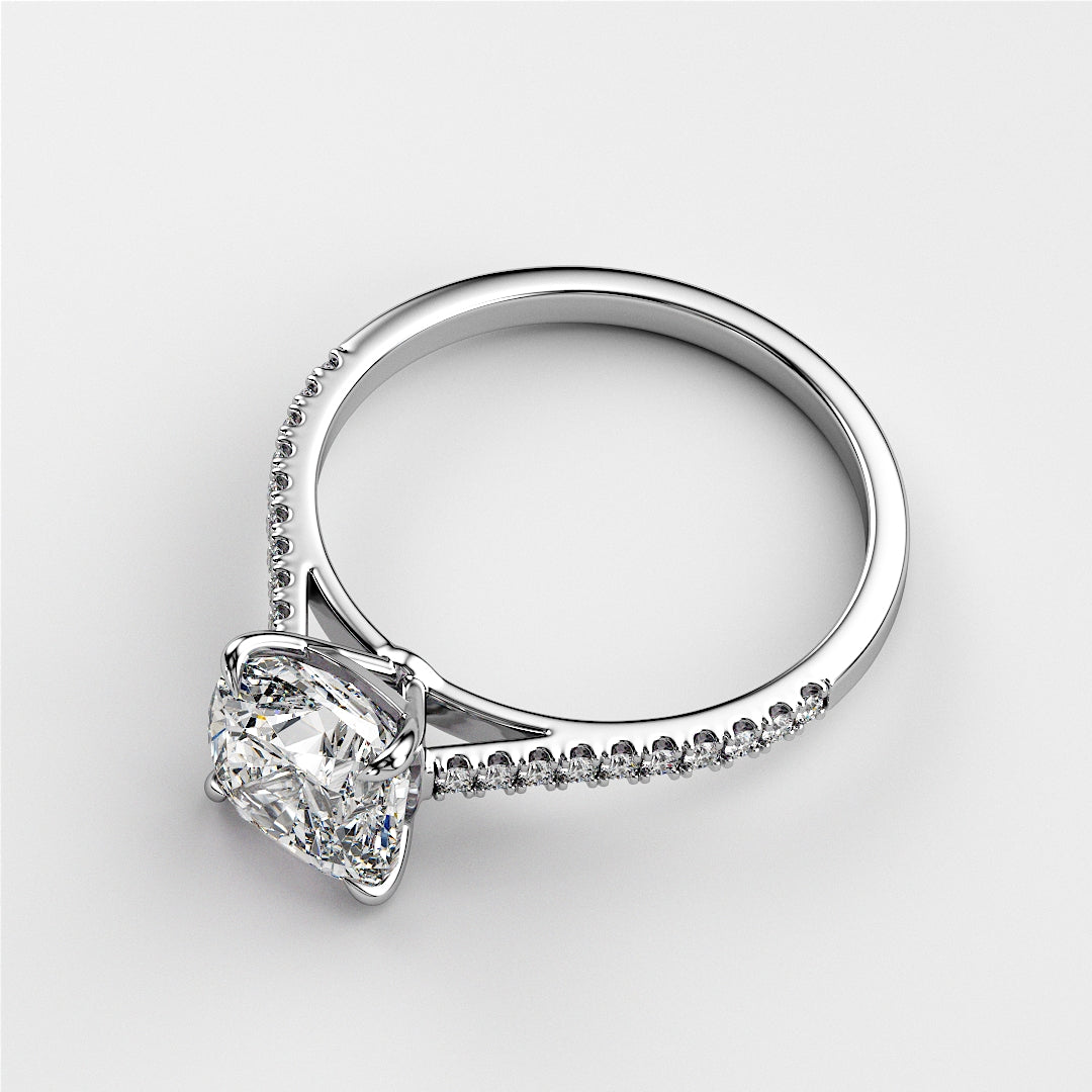 Elegant 14K white gold diamond engagement ring with pave setting and cushion-cut diamond, showcasing sparkling luxury.