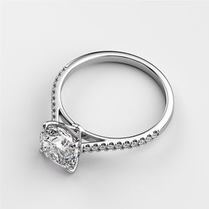 Elegant 14K white gold diamond engagement ring with pave setting and cushion-cut diamond, showcasing sparkling luxury.
