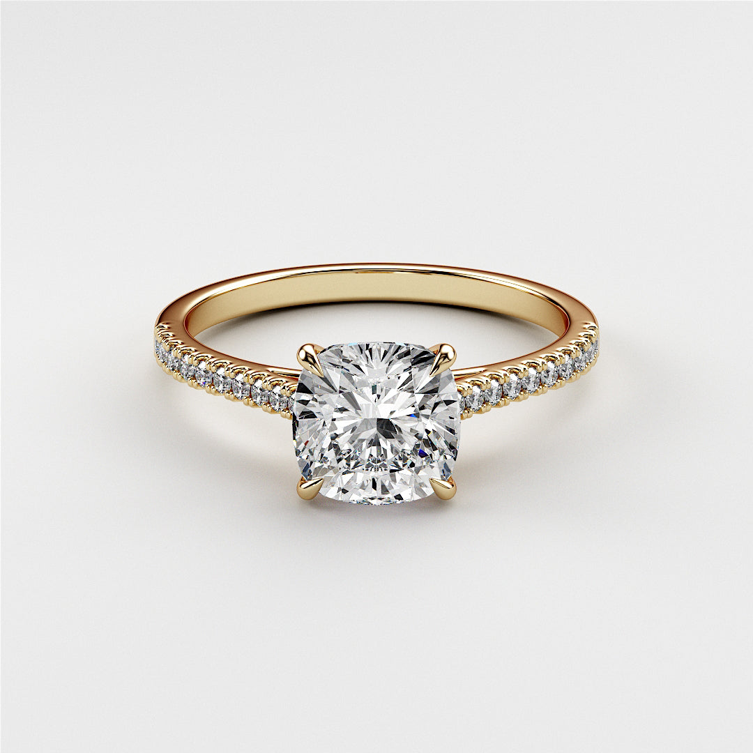 14K gold engagement ring featuring a radiant cushion-cut diamond andPave diamond band. Jewelry not worn on model.