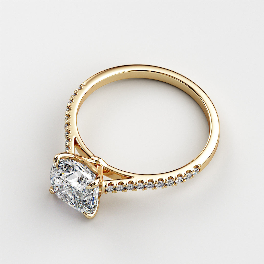 Elegant 14K or 18K gold cushion-cut diamond engagement ring with a pave cathedral band, perfect for a timeless proposal.