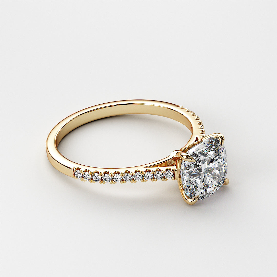 Elegant 14K yellow gold engagement ring featuring a cushion-cut diamond and a sparkling diamond band. Ideal for unforgettable moments.