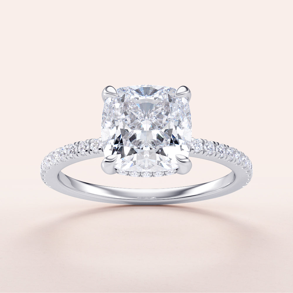 Cushion cut diamond engagement ring in 14K, 18K white gold or platinum, featuring a dazzling pave band and a stunning halo design.|

#14KRecycledWhiteGold
#18KRecycledWhiteGold








#Platinum