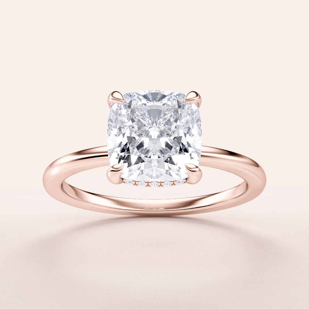 Elegant cushion-cut diamond engagement ring in rose gold, available in 14K, 18K, and platinum, showcasing exceptional brilliance.|







#14KRecycledRoseGold
#18KRecycledRoseGold


