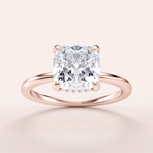 Elegant cushion-cut diamond engagement ring in rose gold, available in 14K, 18K, and platinum, showcasing exceptional brilliance.
